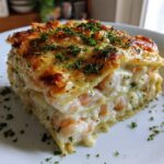 Shrimp lasagna with white sauce and cheese