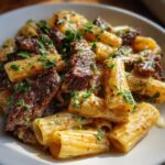 Cajun Steak Tips in Cheesy Rigatoni Parmesan Sauce
