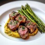 Lamb chops over lobster puree with asparagus