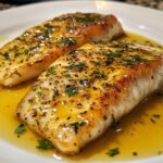 Tender Redfish in Aromatic Lemon Butter Sauce