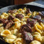 Cajun Steak Bites and Cheesy Garlic Shells Skillet