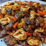 Cheesesteak Tortellini with Provolone Sauce.
