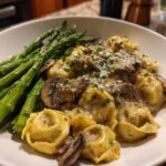 Beef Tortellini with Cheese and creamy mushroom sauce served with buttered asparagus