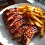 Tender Oven-Baked Ribs with honey glaze and crispy fries